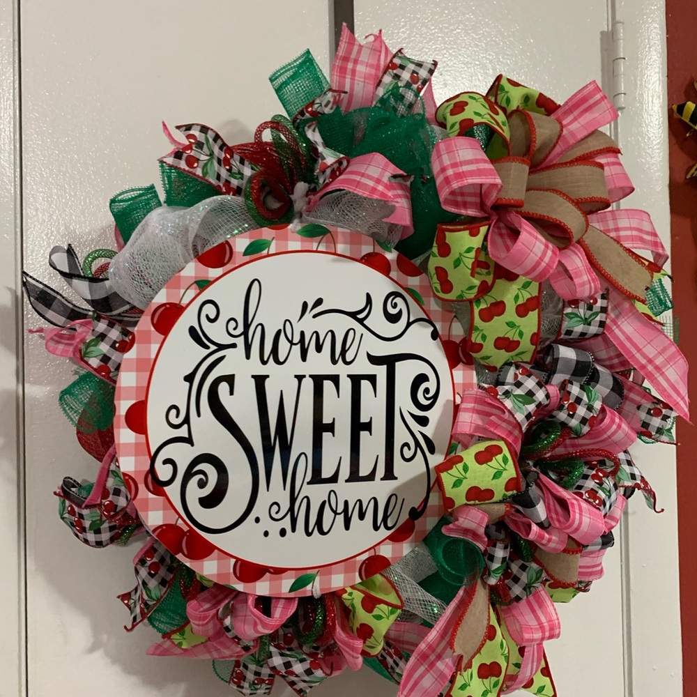 Charming Holiday Wreath with Red and Green Accents Cherries Lovers